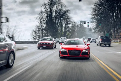 Red Audi R8 Leading Traffic on Wet Highway - free wallpaper 6720×4480