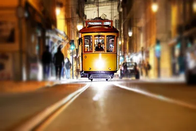 Yellow Tram Number 28 on Lisbon Street at Night - free wallpaper 4096×2731