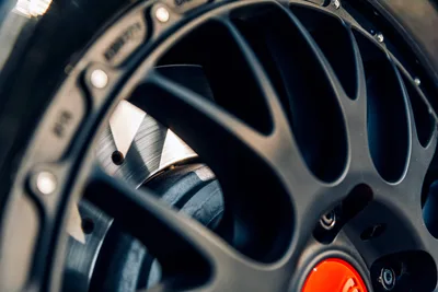 Close-Up Detail of High-Performance Wheel and Brake System - free cars & vehicles wallpaper 6720×4480