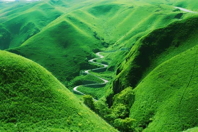 Winding Road Through Lush Green Rolling Hills - free landscapes wallpaper 1920×1280
