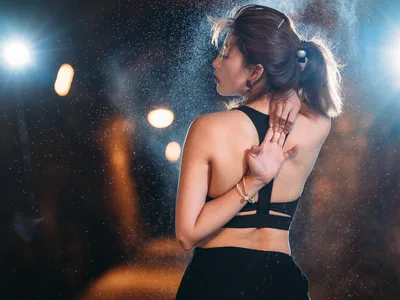 Woman in Sports Attire Under Rainy Night Lights - free people & portraits wallpaper 2000×1500