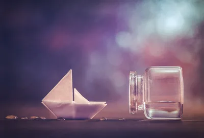 Paper Boat and Glass Jar in Dreamy Purple Light - free photography wallpaper 5730×3862