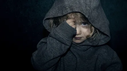 Young Child in Gray Hoodie Against Dark Background - free people & portraits wallpaper 4234×2382