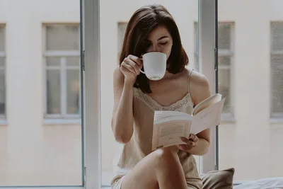 Woman Reading Book While Drinking Coffee by Window - free people & portraits wallpaper 2560×1707
