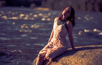 Woman in Beige Dress Kneeling by Water at Sunset - free people & portraits wallpaper 4000×2532