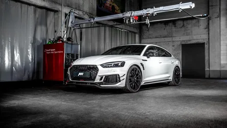 White Audi RS Performance Car in Industrial Workshop - free cars & vehicles wallpaper 3000×1688