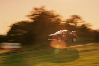 Rally Car in High-Speed Motion on Dirt Road - free cars & vehicles wallpaper 5472×3648
