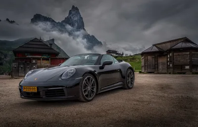 Black Porsche 911 Convertible in Alpine Mountain Setting - free cars & vehicles wallpaper 6144×3929