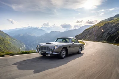 Classic Silver Sports Car on Alpine Mountain Road - free cars & vehicles wallpaper 4000×2667