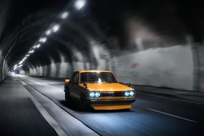 Yellow Classic Car Speeding Through Modern Tunnel - free cars & vehicles wallpaper 1920×1280