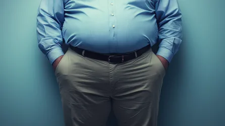 Man in Blue Shirt and Khaki Pants Against Teal Background - free photography wallpaper 5824×3264