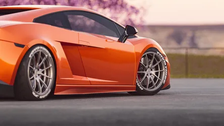 Orange Sports Car with Chrome Wheels on Track - free city & urban wallpaper 1920×1080