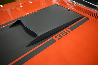 Orange Car Hood with Black Stripe and 396 Badge Detail - free wallpaper 5120×3408