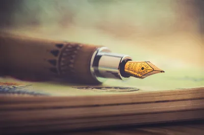Vintage Fountain Pen Nib With Ink On Paper - free wallpaper 1600×1065