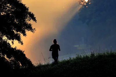 Silhouetted Runner in Golden Sunset Landscape - free people & portraits wallpaper 3072×2048