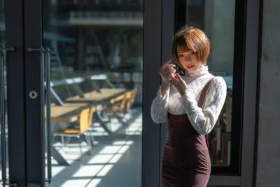 Woman in White Sweater and Brown Skirt by Glass Doors - free people & portraits wallpaper 3000×2000
