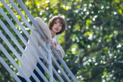 Woman in White Cardigan Against Geometric Lattice - free people & portraits wallpaper 3000×2000