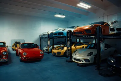 Premium Sports Cars in Modern Underground Garage Storage - free cars & vehicles wallpaper 2048×1365