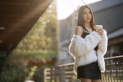 Woman In White Fur Stole With Coffee Cup Outdoors - free people & portraits wallpaper 6144×4096