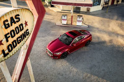 Red Sedan at Vintage Gas Station with Retro Signage - free cars & vehicles wallpaper 3600×2388