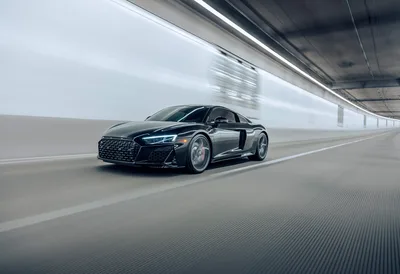 Black Sports Car Driving Through Modern Tunnel - free wallpaper 6551×4480