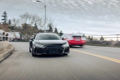 Black Sports Car Driving on Urban Road in Motion - free wallpaper 6720×4480