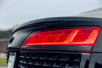 Modern Red LED Taillight on Black Vehicle - free wallpaper 6720×4480