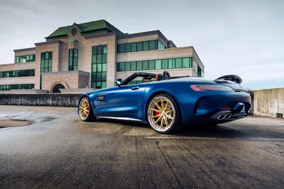 Blue Convertible Sports Car On Urban Rooftop Parking - free cars & vehicles wallpaper 6720×4480