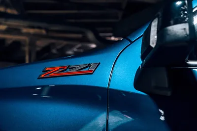 Blue Sports Car with Z71 Badge in Dark Garage - free wallpaper 6000×4000