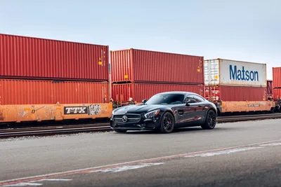 Black Mercedes-AMG Sports Car Beside Freight Train - free cars & vehicles wallpaper 6571×4381