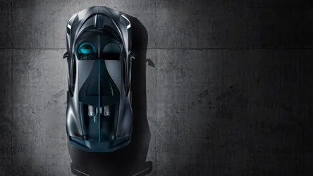 Top-Down View of Sleek Black Sports Car with Blue Accents - free wallpaper 4096×2304