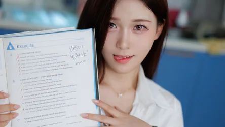 Student Holding English Exercise Worksheet With Annotations - free wallpaper 5328×2997