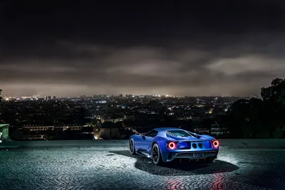 Blue Sports Car on Rooftop Overlooking Night City - free cars & vehicles wallpaper 4096×2731