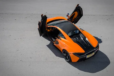 Orange McLaren Sports Car with Open Doors Overhead View - free cars & vehicles wallpaper 4096×2726