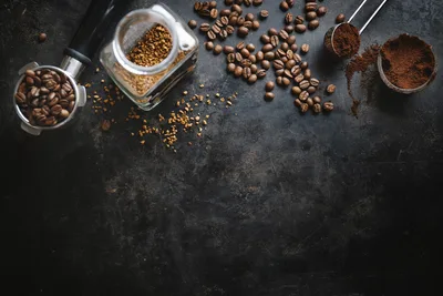 Coffee Beans and Ground Coffee on Dark Surface - free photography wallpaper 6720×4480