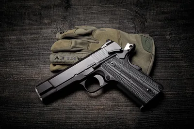 Semi-Automatic Pistol With Tactical Gloves On Dark Wood - free weapons wallpaper 2048×1366