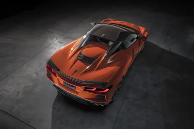 Orange Sports Car Top-Down View in Concrete Garage - free cars & vehicles wallpaper 5700×3800