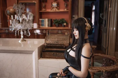 Woman in Black Dress in Ornate Interior Room - free wallpaper 7952×5304
