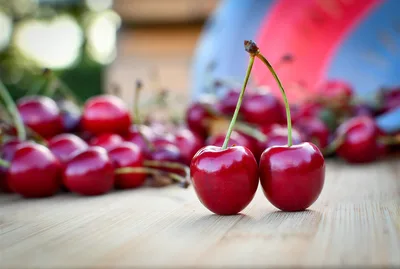 Fresh Red Cherries on Wooden Surface - free wallpaper 2048×1376