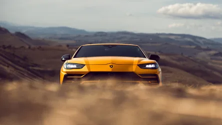Yellow Sports Car in Desert Landscape with Mountains - free wallpaper 2880×1620