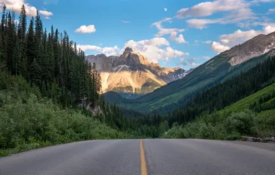 Mountain Road Through Forest Valley - free wallpaper 6104×3884