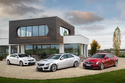 Three Cadillac CTS-V Models Outside Modern House - free cars & vehicles wallpaper 4096×2731