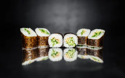 Sushi Rolls on Reflective Black Surface - free food wallpaper 5807×3646