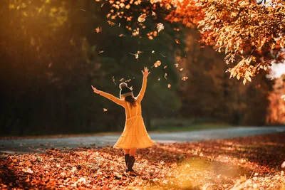 Child in Orange Dress Throwing Autumn Leaves - free wallpaper 6016×4016