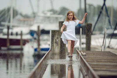 Girl Running Through Rain on Wooden Dock - free people & portraits wallpaper 6144×4096