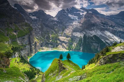 Alpine Lake Valley with Twin Evergreens and Mountain Peaks - free wallpaper 6144×4096