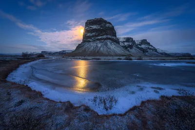 Moonlit Mountain Reflected in Frozen Lake at Dusk - free wallpaper 6144×4096