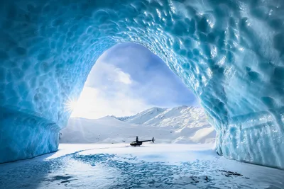 Helicopter Landing in Massive Ice Cave Tunnel - free wallpaper 6144×4096