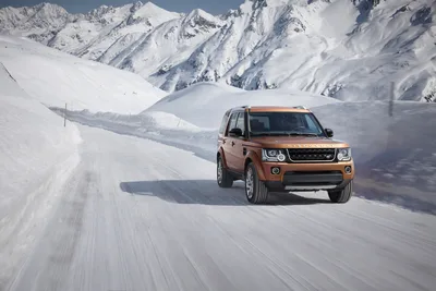 Land Rover Discovery Driving Through Alpine Snow - free cars & vehicles wallpaper 4000×2667
