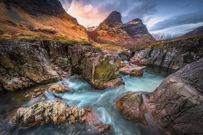 Alpine Stream Through Rocky Mountain Valley at Dusk - free wallpaper 6144×4096